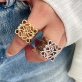 Pave metal flower ring