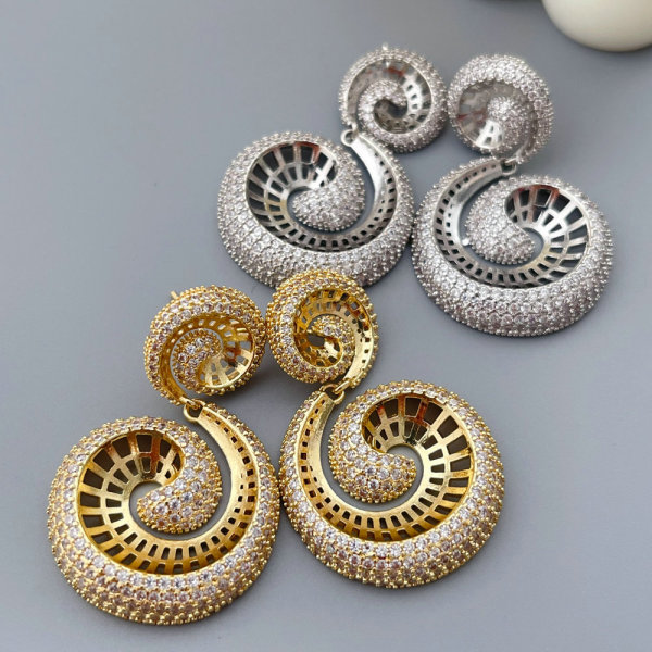 Pave zircon snail earrings