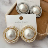 Big pearl earrings