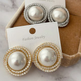 Big pearl earrings