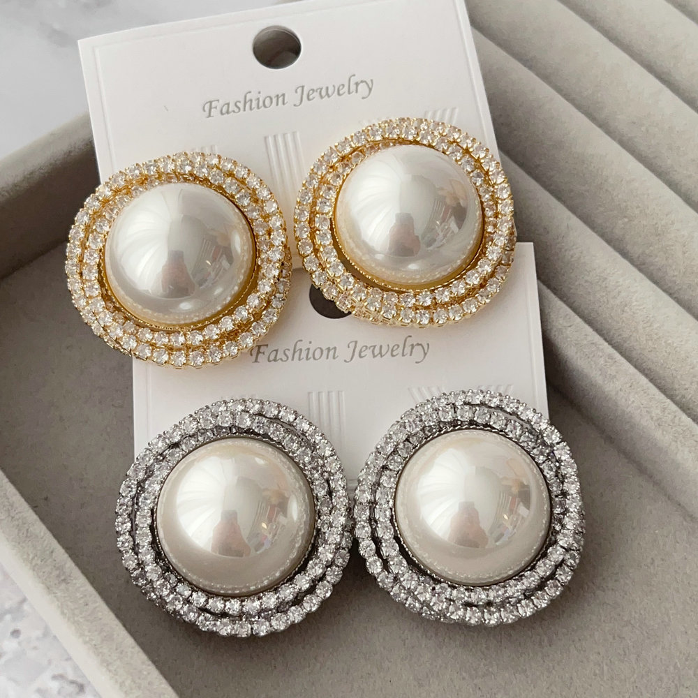 Big pearl earrings