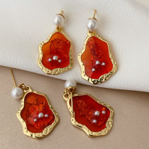 Red charm earrings