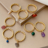 Cuban ring with small gemstone