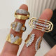 Pave zircon two tone wing ring