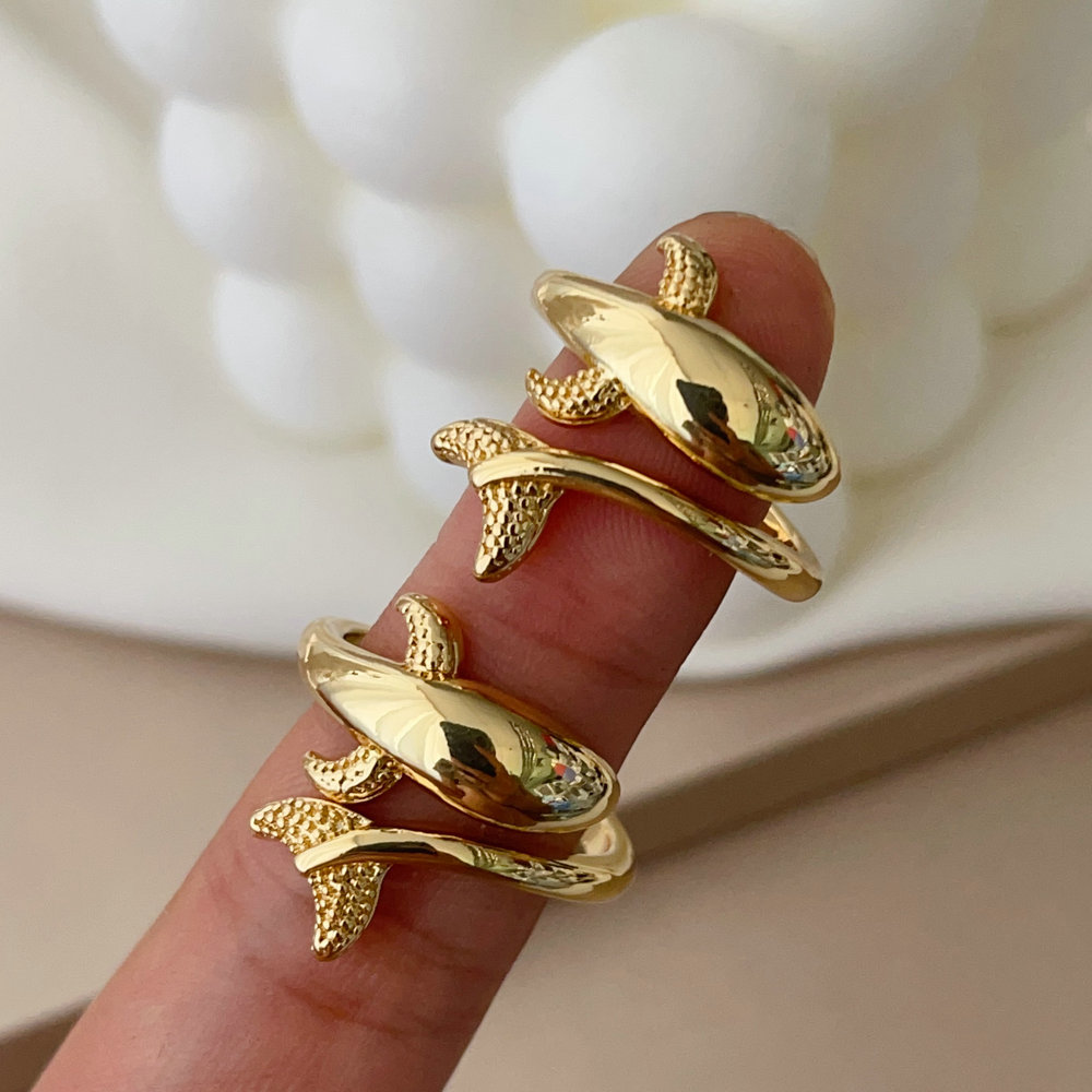 Metal dolphin ring