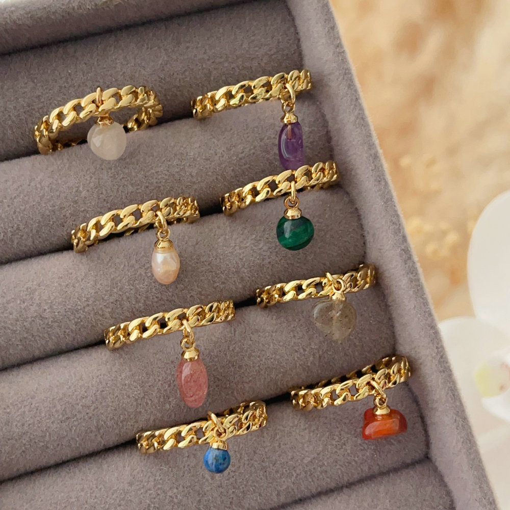 Cuban ring with small gemstone