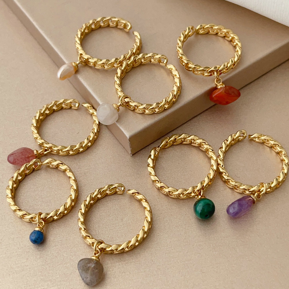 Cuban ring with small gemstone