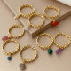Cuban ring with small gemstone