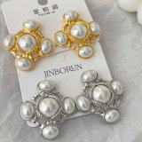 Pearl cross earrings