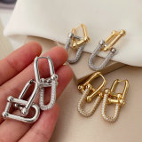 Horseshoe buckle earrings