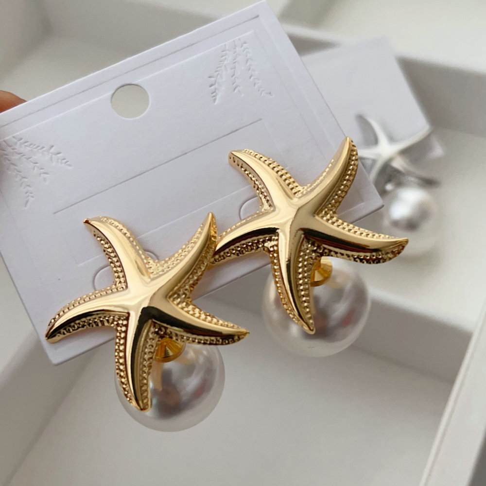 Star pearl drop earrings