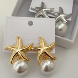 Star pearl drop earrings