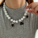 Glass pearl necklace with enamel heart charm