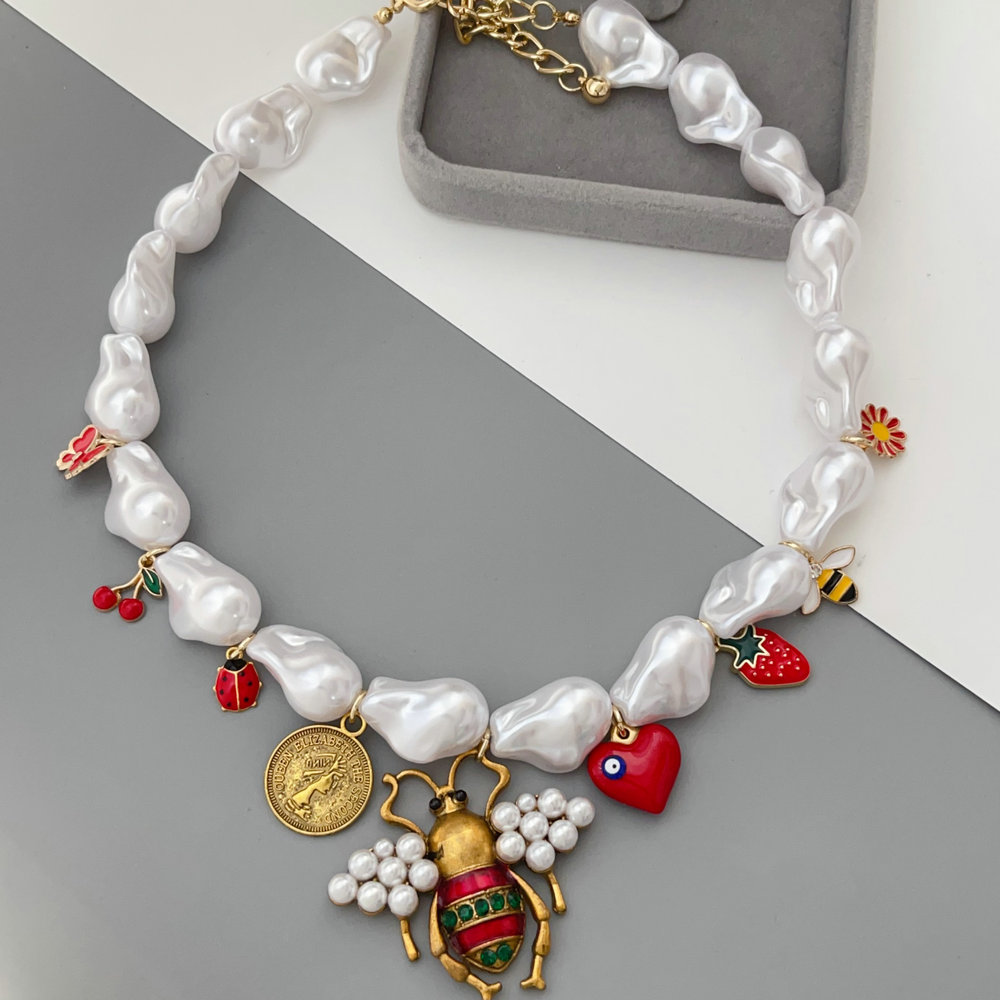 Bee charm glass pearl necklace