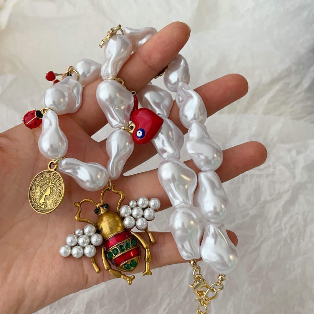 Bee charm glass pearl necklace
