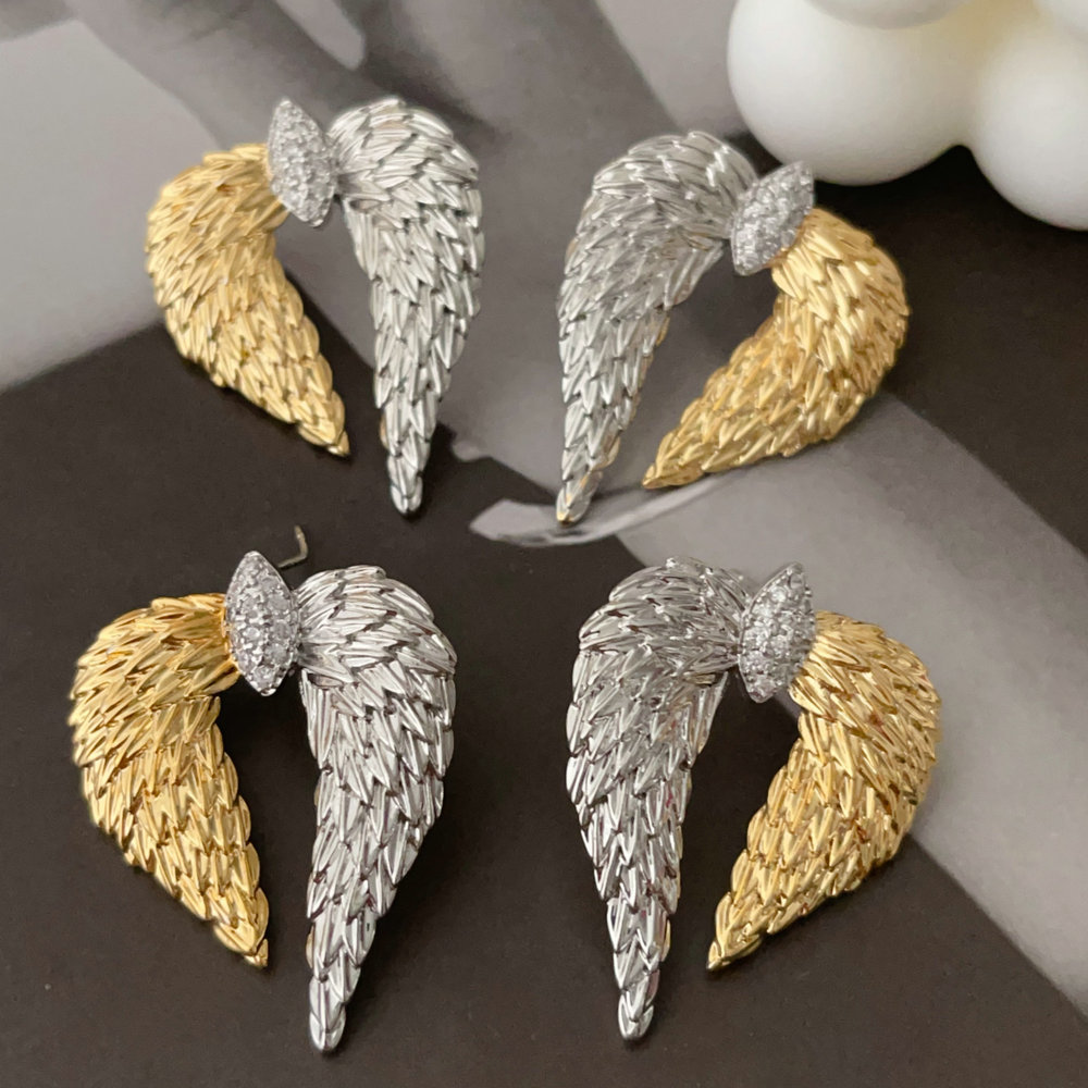 Two tone wing earrings