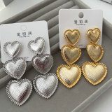 Chunky metal heart earrings