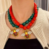 Bee charm necklace
