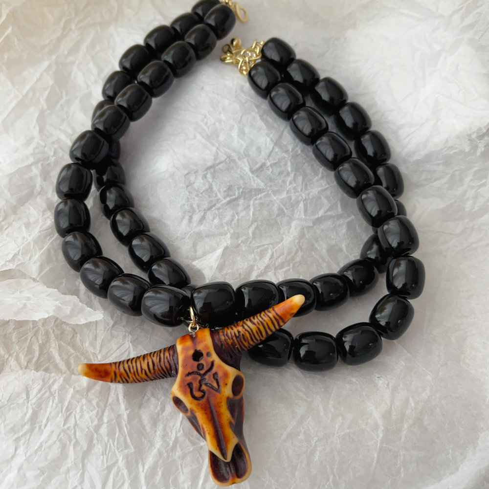 Bull black bead necklace