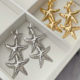 Metal star earrings