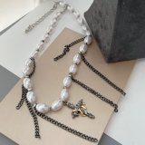 Glass pearl necklace with black chain tassel