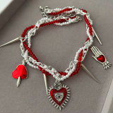 Red charm beaded necklace