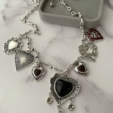 Black heart charm necklace