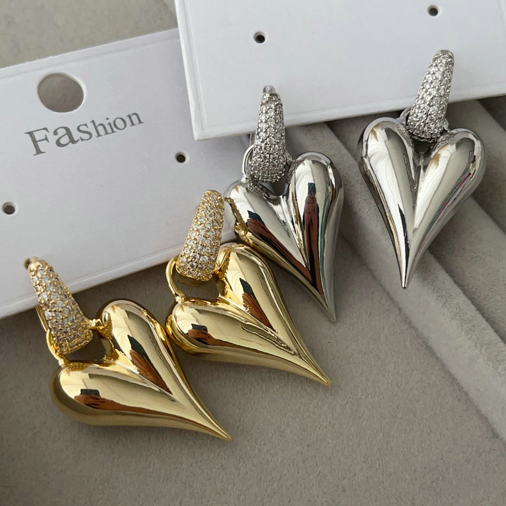 Heart charm earrings