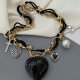 Black heart pendant necklace