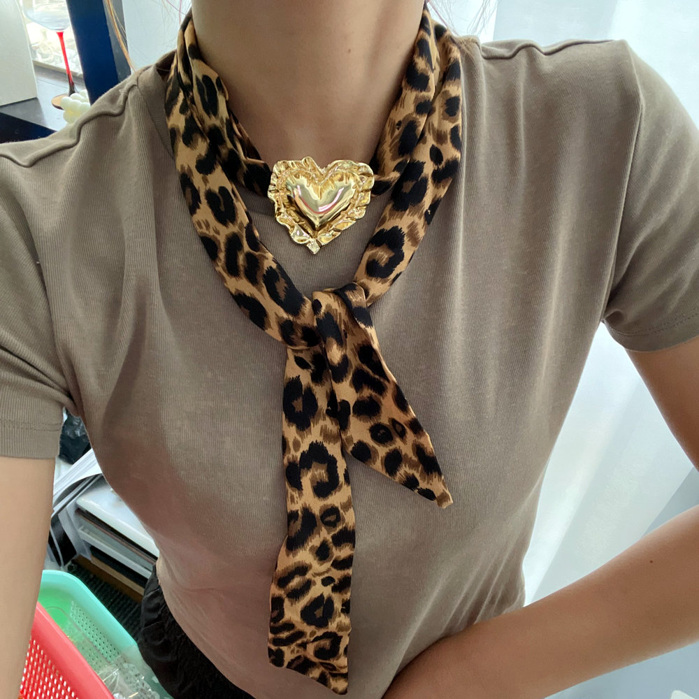Leopard print heart necklace