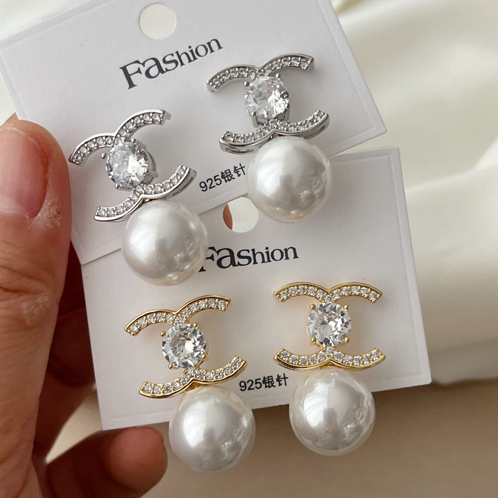 Channel pearl earrings
