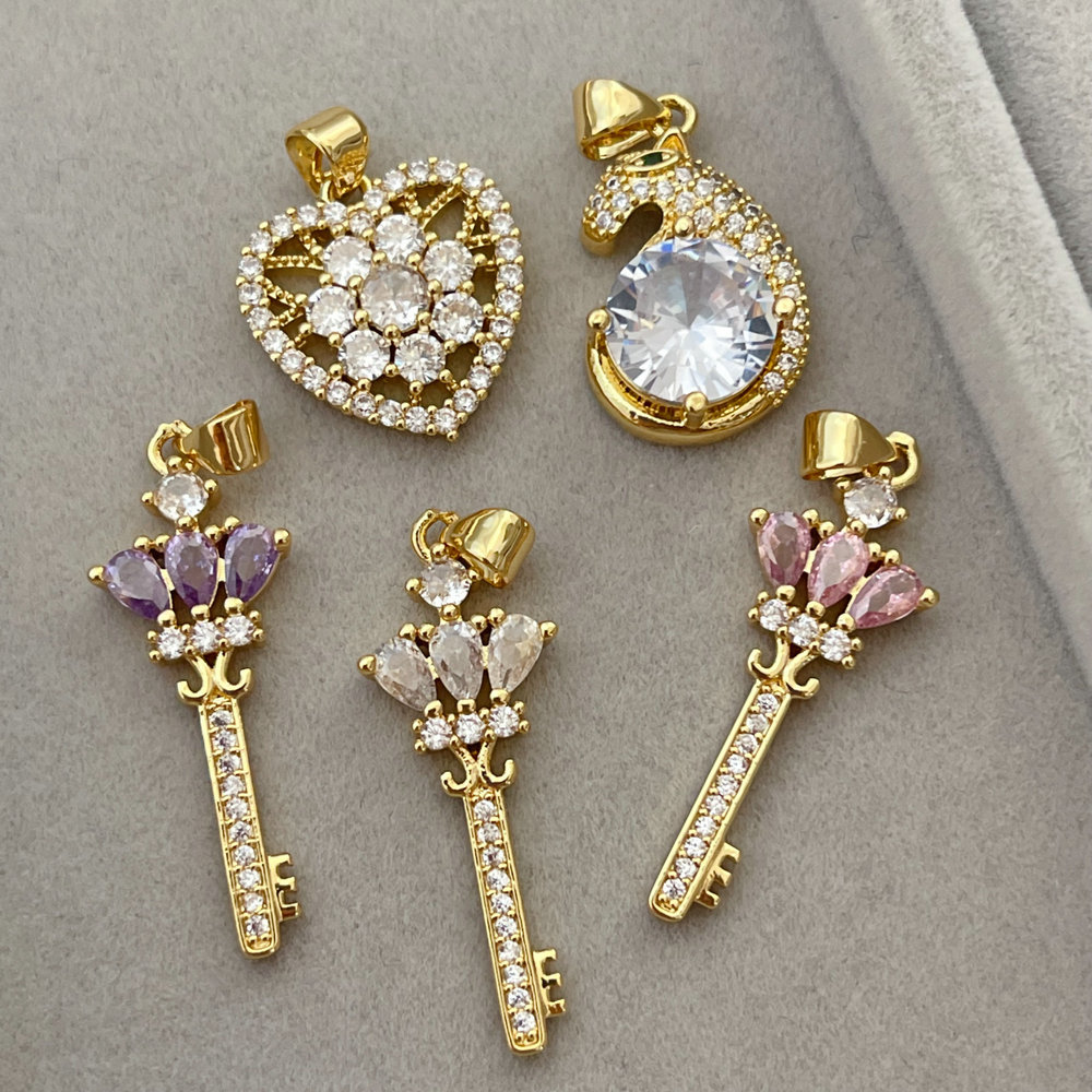 Pave zircon heart key charm