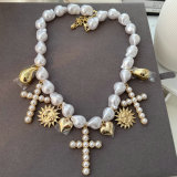 Plastic pearl cross pendant necklace