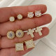 Pave zircon round shape earrings