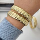 Elastic wave charm bracelet