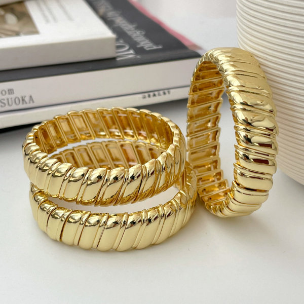 Elastic wave charm bracelet