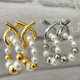 Cross pearl drop earrings