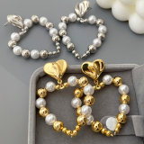 Pearl heart charm earrings