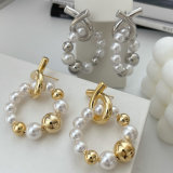 Cross pearl drop earrings