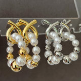 Cross pearl drop earrings