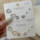 Set pave heart earrings