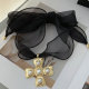 Blak cord necklace with big cross pendant