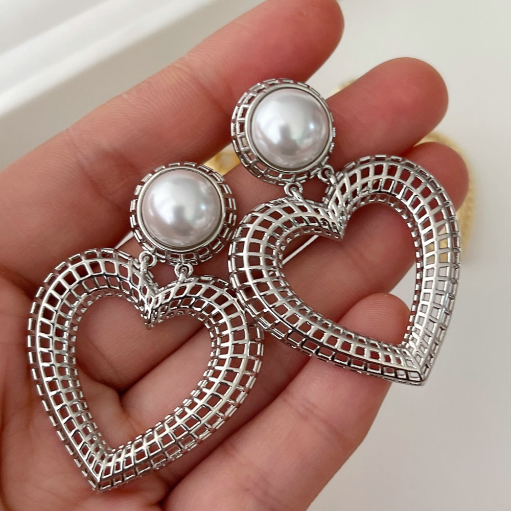 Heart charm earrings