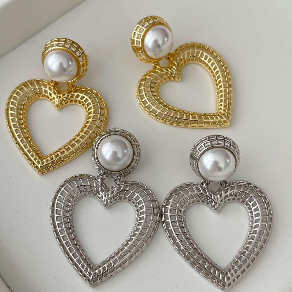 Heart charm earrings