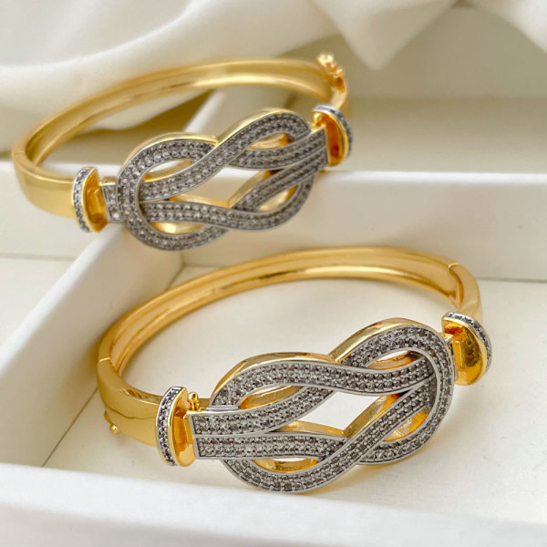Pave two tone twist bangle