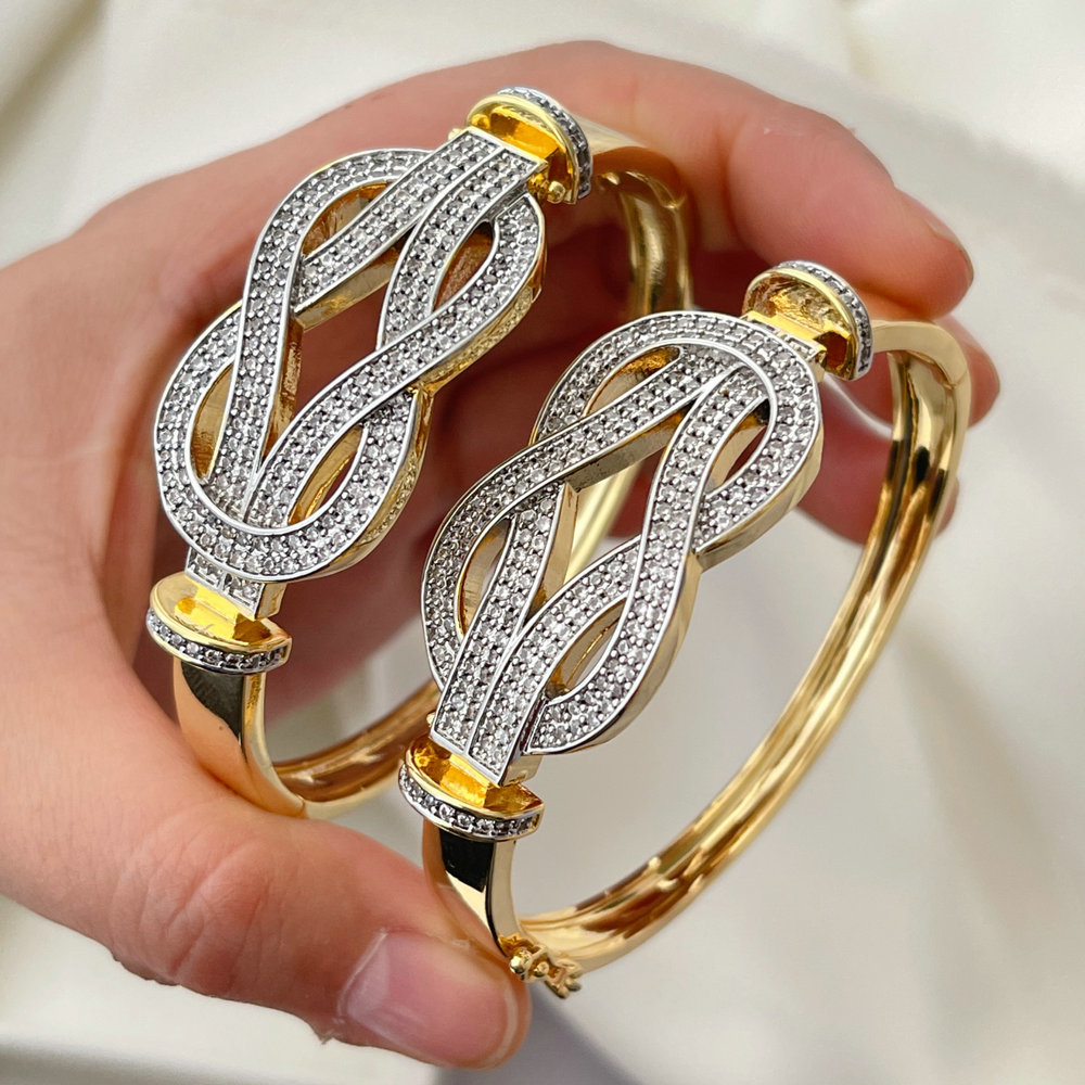 Pave two tone twist bangle