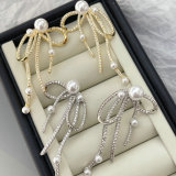 Pave zircon bow pearle earrings