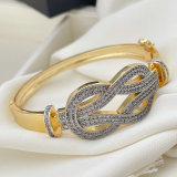 Pave two tone twist bangle