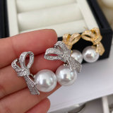 Pave zircon bow pearl earrings