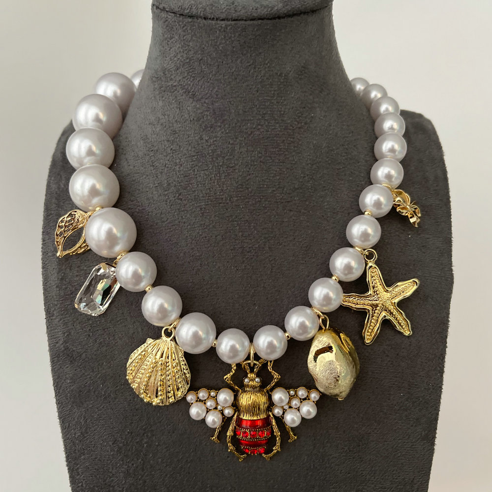 Glass pearl bee charm necklace